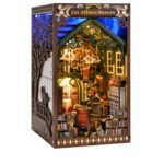 Book Nook Cat Affairs Bureau Miniature Kit with illuminated cat office, books, files, plants, and blue night lighting
