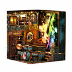 Book Nook Kit Explosive Notes Miniature Kit with piano, drums, balcony and colorful guitar artwork on white