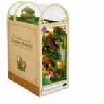 Book Nook Kit Firefly Forest DIY Kit with illuminated woodland, treehouse, flowers, mushrooms, and arched case