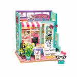 Book Nook Kit Hello Kitty Bookstore with turquoise shop, striped awning, books, plants and character figure