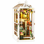 Book Nook Kit Romantic Garden DIY Kit with white greenhouse frame, pink roses, chair, flowers and cactus on white