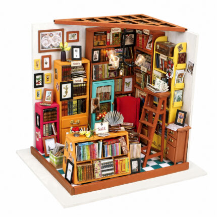 Book Nook Kit Sam's Study miniature library with bookshelves, red chair, ladder and reading desk on white
