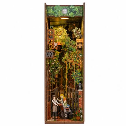 Secret Garden DIY Book Nook Kit for Miniature Scenes with flowering trees, garden gate, figures, and warm light