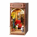 Book Nook Kit Shakespeare DIY Kit with illuminated library, red reading chair, bookshelves, plants, and miniature books