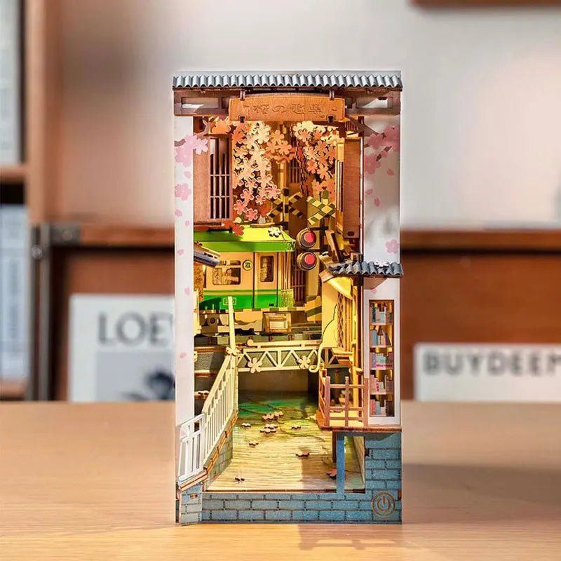 Decorative DIY book nook kit with warm miniature shelf display