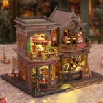 Letter Coffee miniature bookshop model displayed against library shelves with detailed café rooms